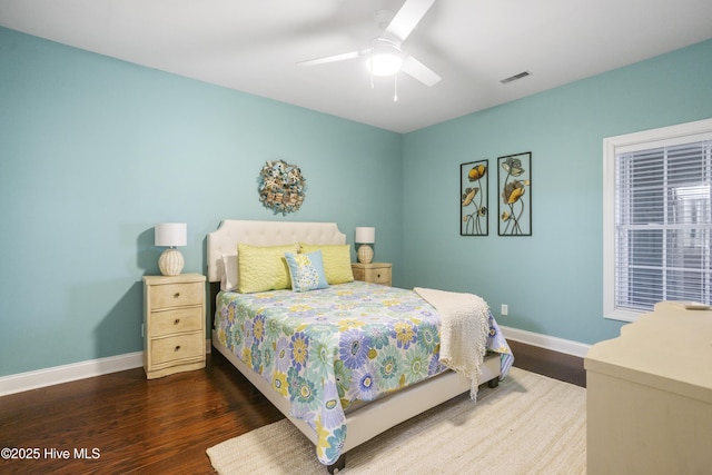 bedroom featuring dark wood-type flooring and ceiling fan