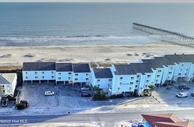 drone / aerial view with a view of the beach and a water view