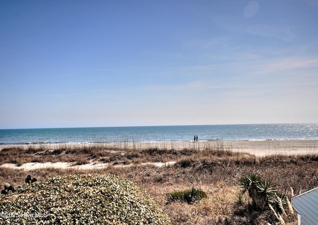 property view of water featuring a beach view