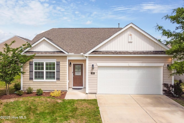 view of front of house featuring concrete driveway, an attached garage, board and batten siding, and roof with shingles