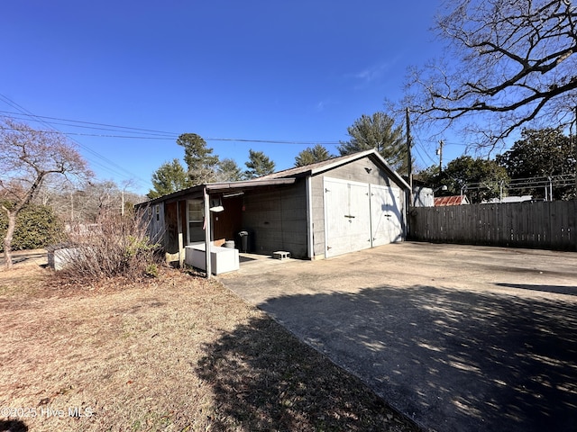 garage featuring a carport