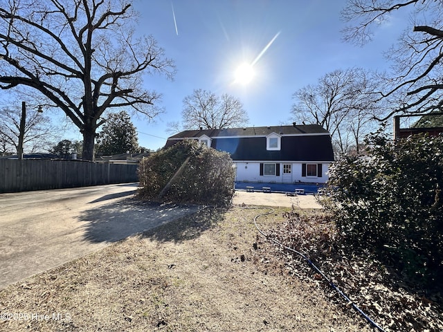 back of property featuring a patio