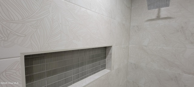 interior details featuring a shower