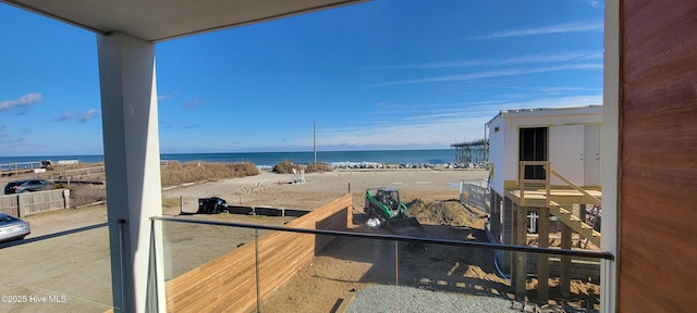 property view of water featuring a beach view