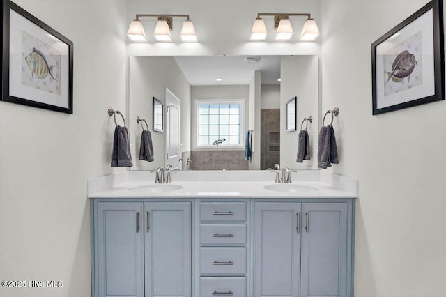 bathroom featuring vanity and walk in shower