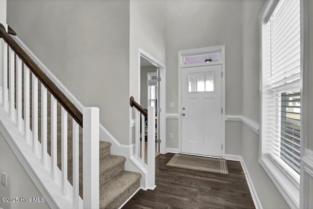 entryway featuring dark wood-type flooring