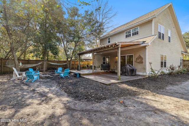 back of property featuring a patio