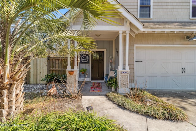 doorway to property featuring a garage