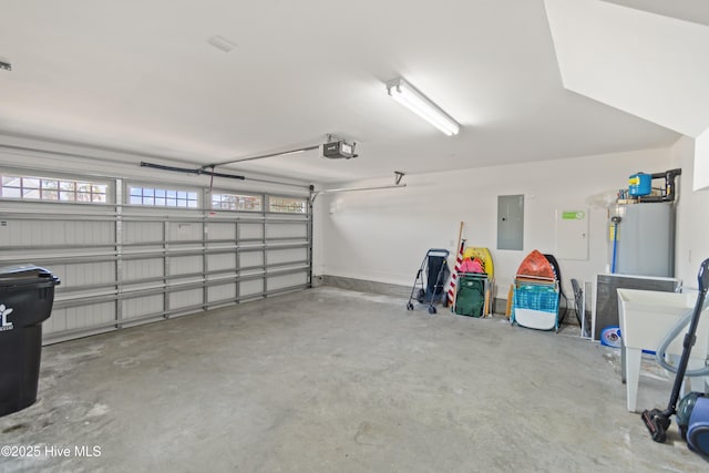 garage with a garage door opener and electric panel