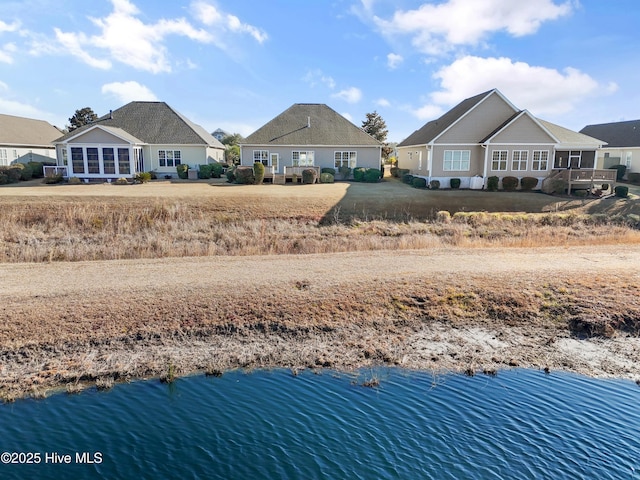 view of yard with a water view