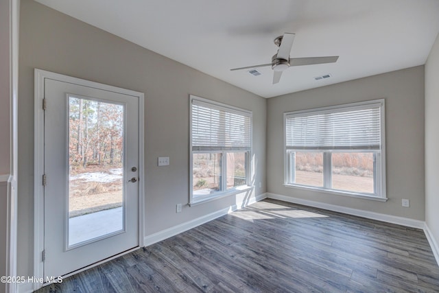 interior space with dark hardwood / wood-style floors and ceiling fan