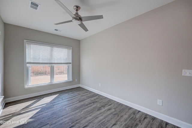 unfurnished room with hardwood / wood-style floors and ceiling fan