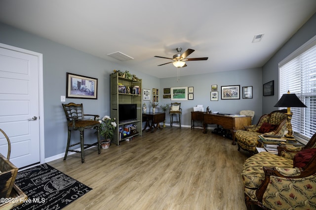 interior space featuring light hardwood / wood-style flooring and ceiling fan