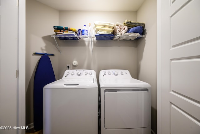 laundry room with separate washer and dryer