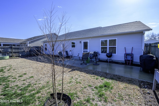 back of house featuring a patio