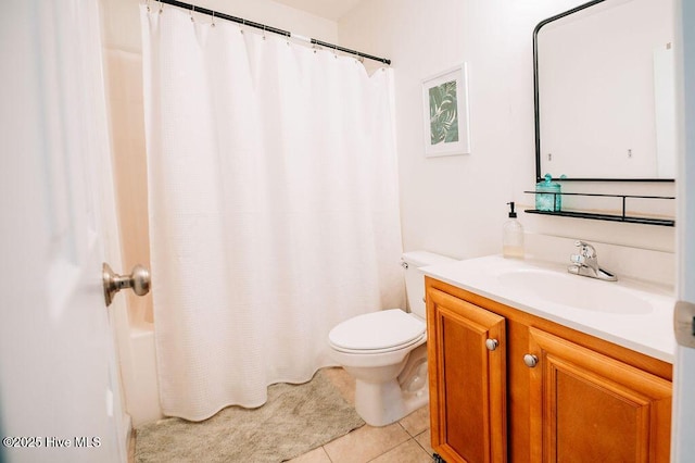 full bathroom featuring tile patterned flooring, vanity, shower / tub combo, and toilet