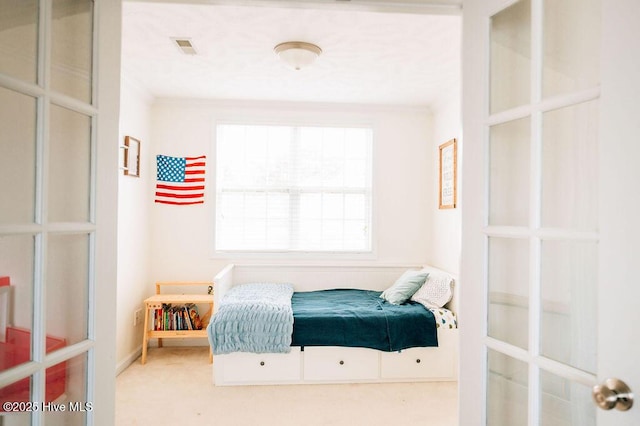 bedroom featuring crown molding