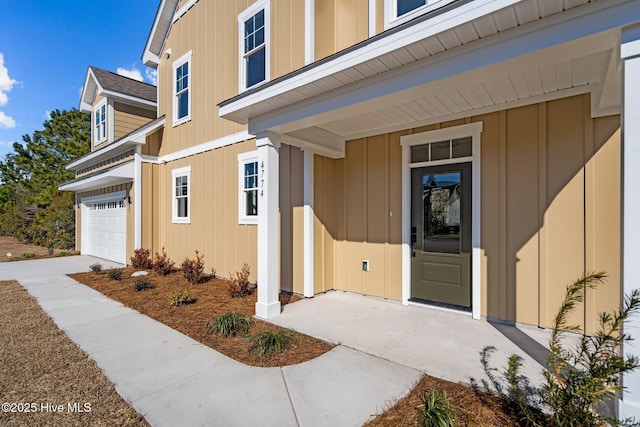 entrance to property featuring a garage