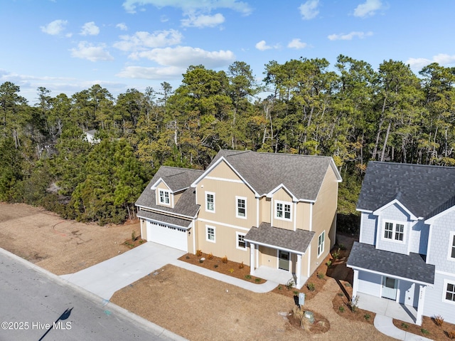 view of front of property featuring a garage and covered porch