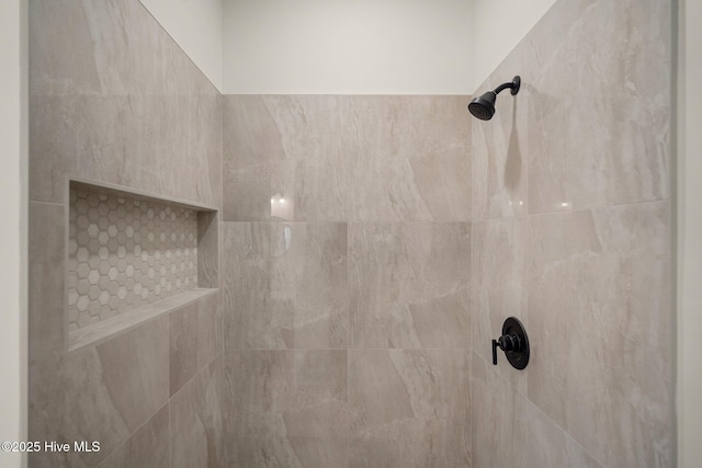 details featuring a tile shower