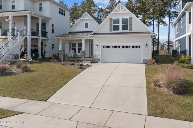 view of front of home with a garage, a front lawn, central air condition unit, and a porch