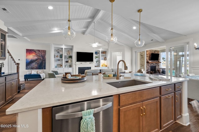 kitchen with sink, vaulted ceiling with beams, dark hardwood / wood-style flooring, dishwasher, and a kitchen island with sink