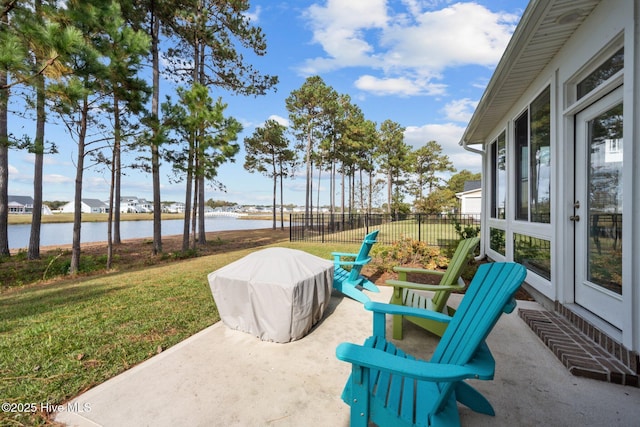 view of patio / terrace featuring a water view