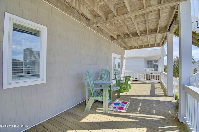 wooden balcony featuring a wooden deck