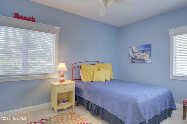 bedroom featuring ceiling fan and carpet flooring