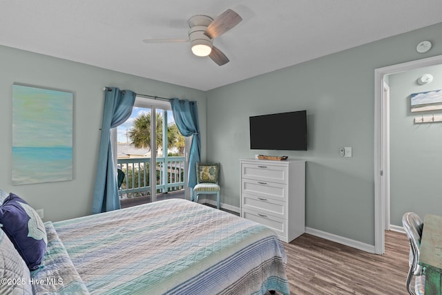 bedroom with hardwood / wood-style floors and ceiling fan