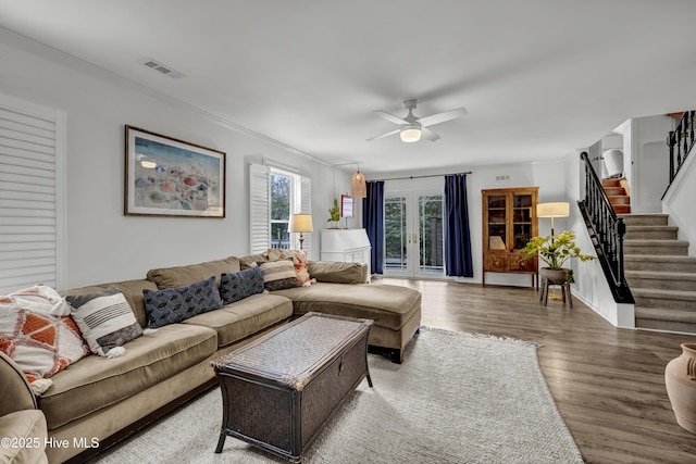 living room with french doors, hardwood / wood-style flooring, and ceiling fan