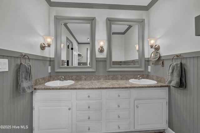 bathroom with vanity and crown molding