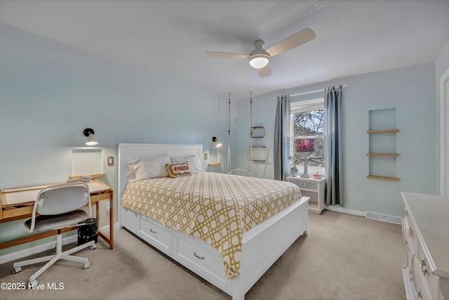 carpeted bedroom with ceiling fan