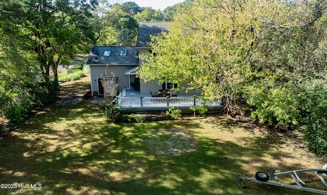 view of yard with a deck