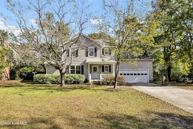 view of property with a front yard, a garage, and a porch