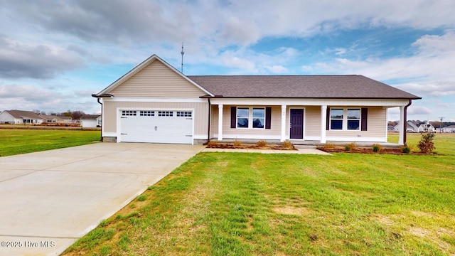 ranch-style house featuring a garage, covered porch, and a front yard