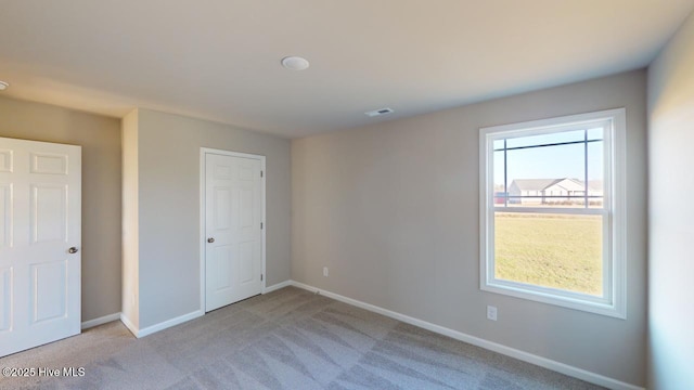 104 Bethany Pl, Goldsboro, NC 27530 - unfurnished bedroom with light colored carpet