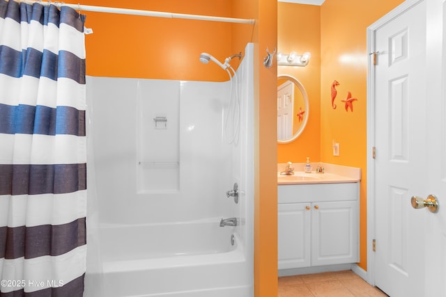 bathroom featuring vanity, shower / bathtub combination with curtain, and tile patterned floors