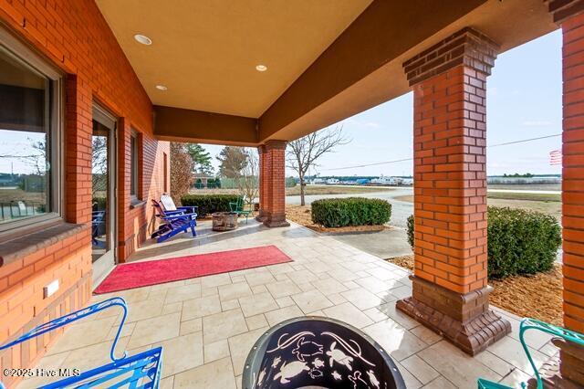 22327 NC Highway 55, Oriental, NC 28571 - view of patio / terrace with an outdoor fire pit