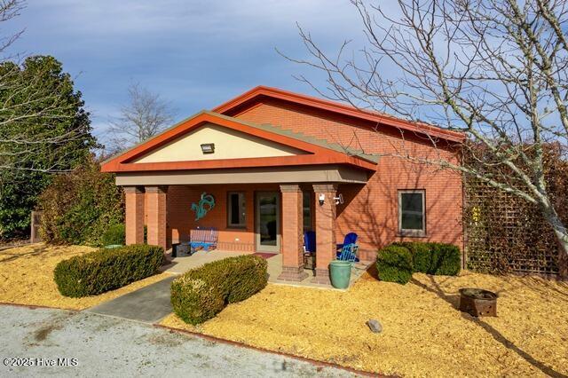 22327 NC Highway 55, Oriental, NC 28571 - view of front facade featuring covered porch
