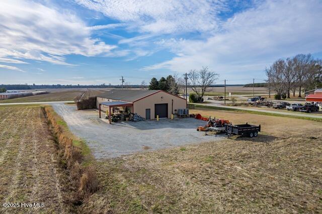 22327 NC Highway 55, Oriental, NC 28571 - exterior space featuring an outbuilding, a garage, and a rural view