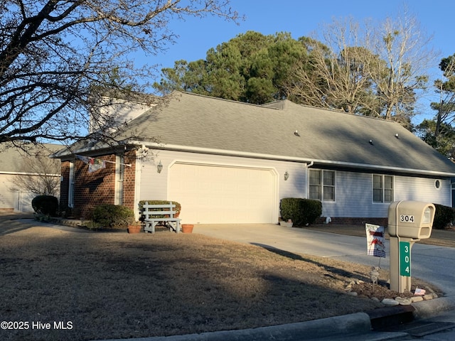 ranch-style home with a garage