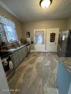 kitchen featuring stainless steel fridge