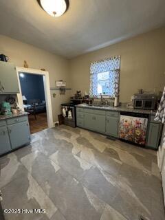 kitchen with dishwashing machine and sink