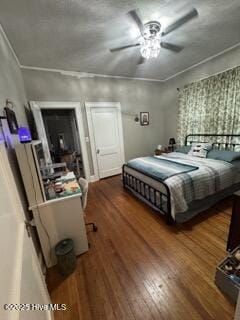 bedroom featuring ceiling fan and hardwood / wood-style floors