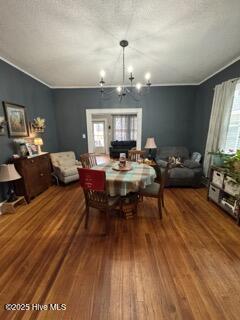 dining room featuring a notable chandelier and wood-type flooring