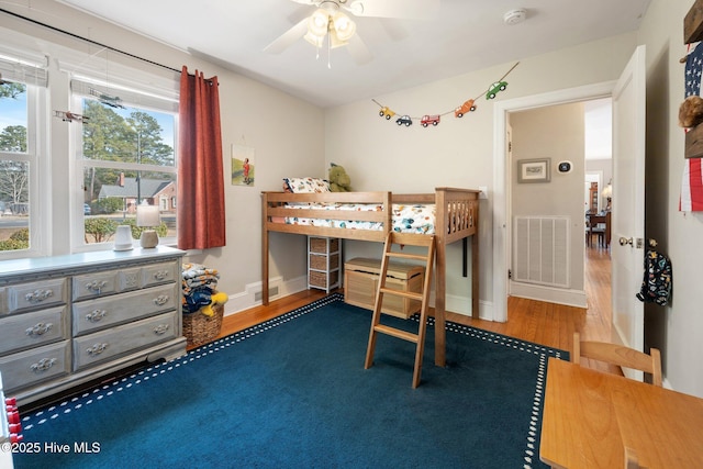 bedroom featuring wood-type flooring