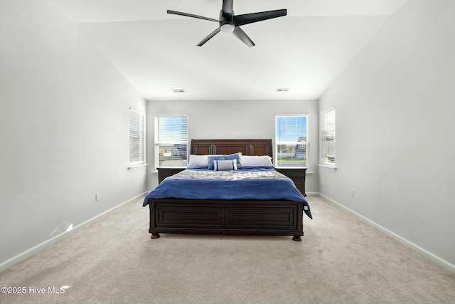 bedroom with light carpet and ceiling fan