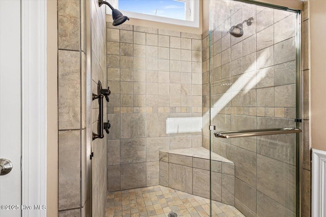 bathroom with a stall shower