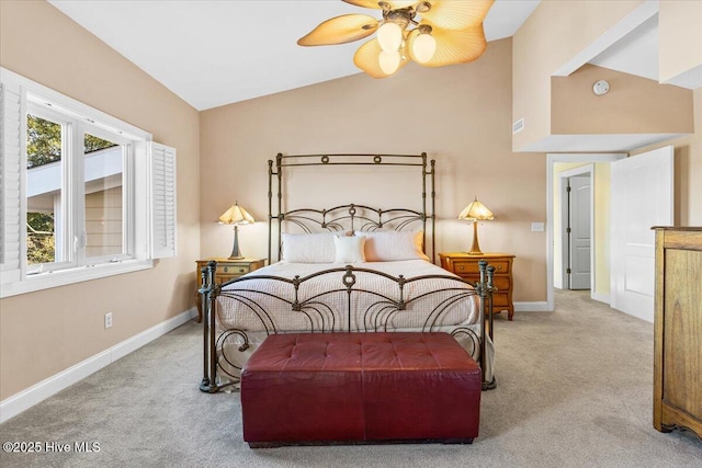 bedroom with vaulted ceiling, ceiling fan, carpet flooring, and baseboards